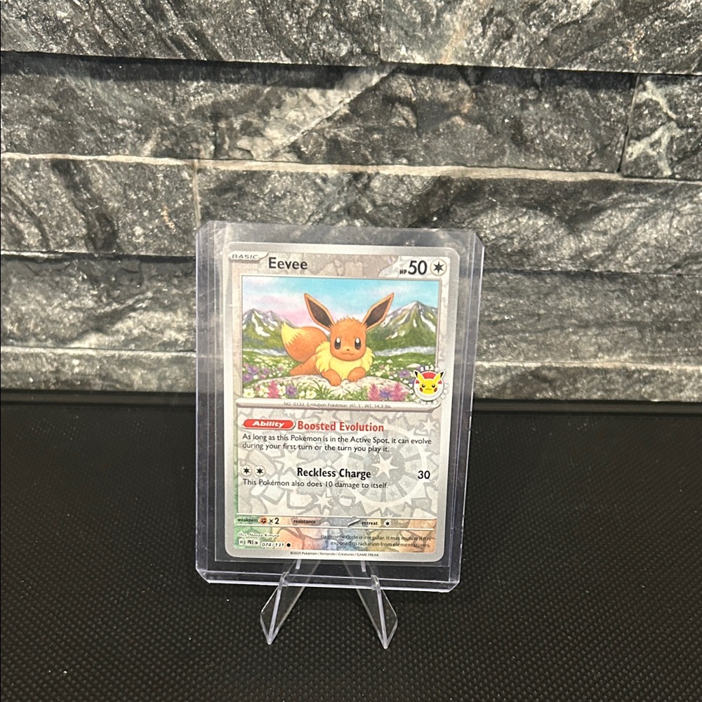 Pokemon Eevee 074/131 “Pokemon Day” Stamped Reverse Cosmos Holo M/NM (2025)